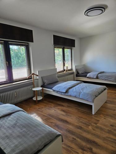 Cama o camas de una habitación en MaxMir - Ortlohn Iserlohn
