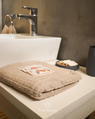 a towel sitting on top of a bathroom sink at The House in City Bell