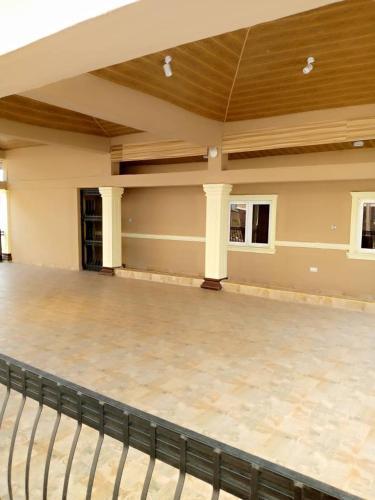 an empty room with a stage in a building at Folulakes Regal Villas in Ibadan