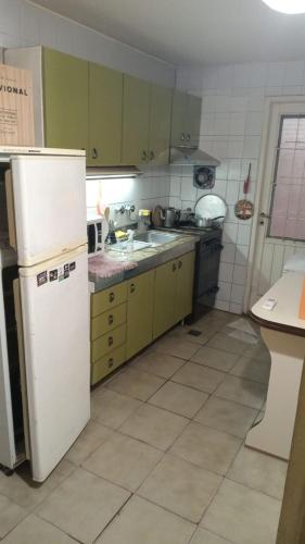 Kuchyň nebo kuchyňský kout v ubytování a TRES MIN DEL CENTRO