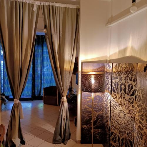 Ένα ή περισσότερα κρεβάτια σε δωμάτιο στο LaBandaBassottiFerrara