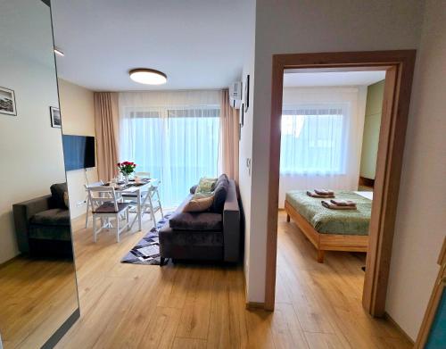 Ένα ή περισσότερα κρεβάτια σε δωμάτιο στο Apartament Miro