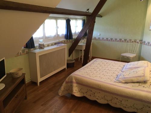 Ліжко або ліжка в номері L'Ile Normande