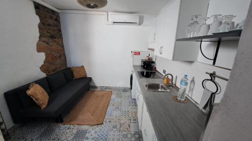 Η κουζίνα ή μικρή κουζίνα στο LAZURITE MASPALOMAS Apartamentos Sur Gran Canaria