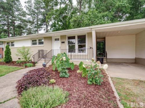 a house with a garden in front of it at The Duke Retreat Close to Duke & Downtown Villa in Durham