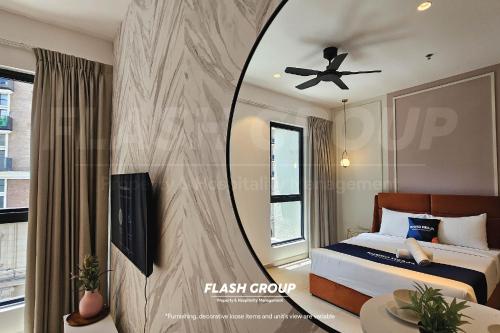 a bedroom with a bed and a mirror on the wall at Paxtonz Premium Suites Petaling Jaya in Petaling Jaya
