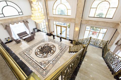an overhead view of a staircase in a building at Duc Huy Grand Hotel and Spa in Lao Cai
