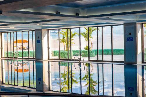 a view of the pool from the lobby of a resort at Duc Huy Grand Hotel and Spa in Lao Cai