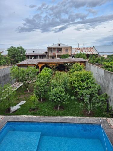an aerial view of a backyard with a swimming pool at Alyona's house in Vagharshapat