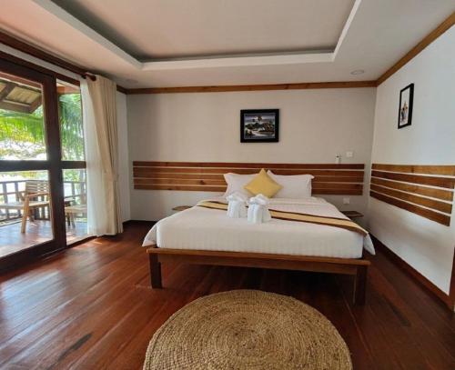 Postel nebo postele na pokoji v ubytování DG ROYAL Resort