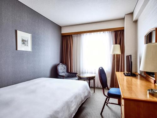 Katil atau katil-katil dalam bilik di Royal Pines Hotel Yonezawa - Opening in Mar 2025