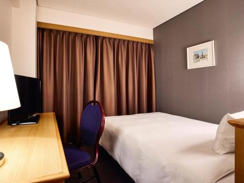 Katil atau katil-katil dalam bilik di Royal Pines Hotel Yonezawa - Opening in Mar 2025