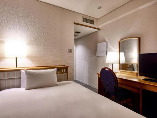 Katil atau katil-katil dalam bilik di Royal Pines Hotel Yonezawa - Opening in Mar 2025