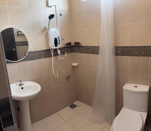 Ванная комната в Homestay - Casa Qhatalia - 10 Pax