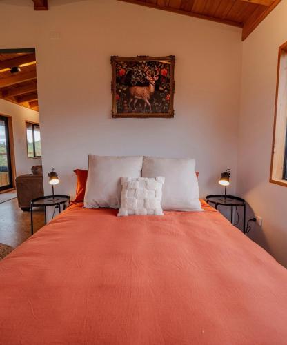 Ένα ή περισσότερα κρεβάτια σε δωμάτιο στο Mania Lodge