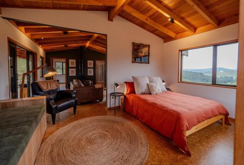Ένα ή περισσότερα κρεβάτια σε δωμάτιο στο Mania Lodge