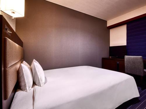 Katil atau katil-katil dalam bilik di Royal Pines Hotel Yonezawa - Opening in Mar 2025