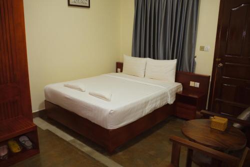 Una cama o camas en una habitación de LISEKA Hotel