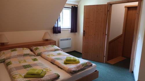 Postel nebo postele na pokoji v ubytování Haus am See