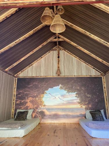 Μια τηλεόραση ή/και κέντρο ψυχαγωγίας στο A Tea Hillside Bungalow