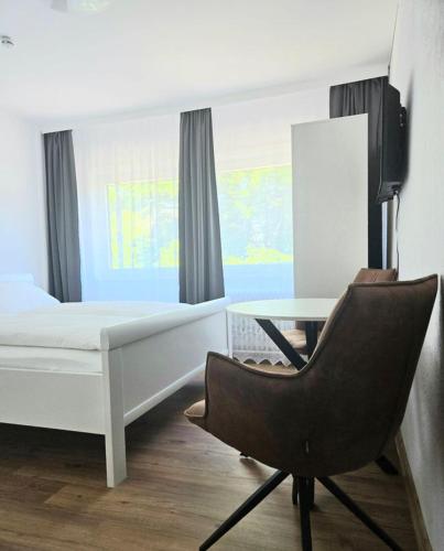 Una cama o camas en una habitación de Damhirsch