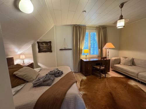 Ένα ή περισσότερα κρεβάτια σε δωμάτιο στο Villa Santala