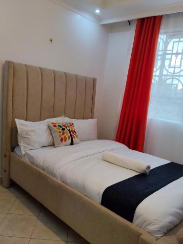 Cama o camas de una habitación en Rembeka Furnished 3BR Chui