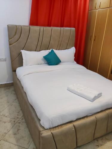 Cama o camas de una habitación en Rembeka Furnished 3BR Chui