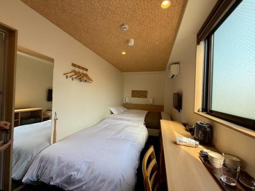 Xcellent Hotelにあるベッド