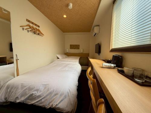 Xcellent Hotelにあるベッド