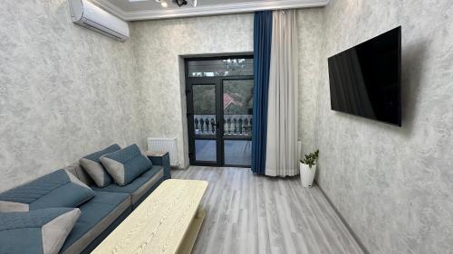 Μια τηλεόραση ή/και κέντρο ψυχαγωγίας στο Renaissance terrace by 7daysApartments