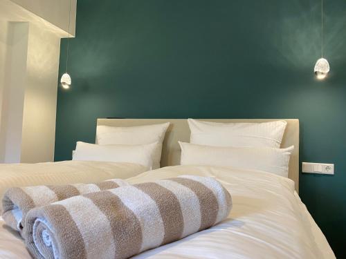 Letto o letti in una camera di Braunlage Lodge