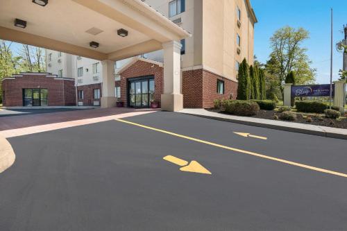 an empty parking lot in front of a building at Sleep Inn & Suites in Gettysburg