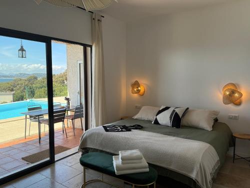 Ένα ή περισσότερα κρεβάτια σε δωμάτιο στο Maison Lumio