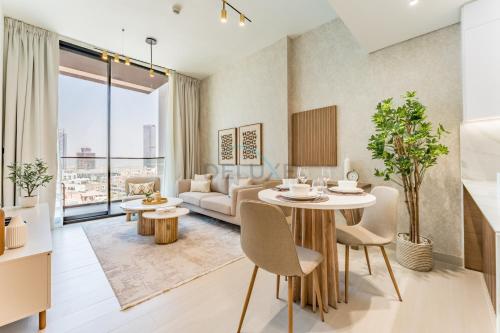 Community Views 1BR Next to Mall and Park, Binghatti Amber, Jumeirah Village Circle by Deluxe Holiday Homes