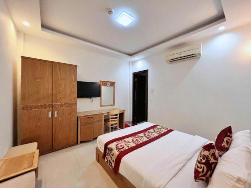 Postel nebo postele na pokoji v ubytování Sophia Sky Hotel
