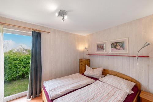 Ένα ή περισσότερα κρεβάτια σε δωμάτιο στο Möve Aba Bungalow 67