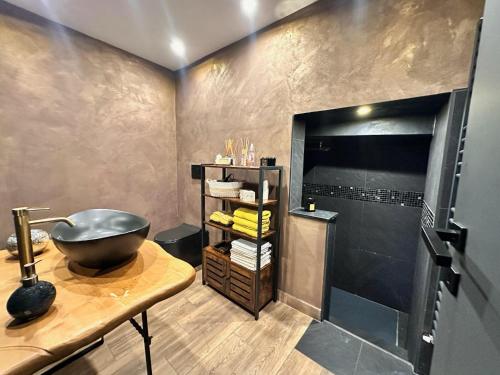 a bathroom with a sink and a shower at Casa Rebecca in Busalla