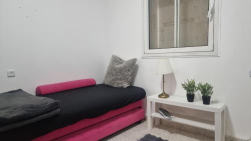 Ruang duduk di שלומית למשפחה