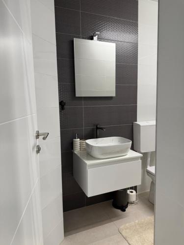 Ένα μπάνιο στο Vacation Apartment Noemi