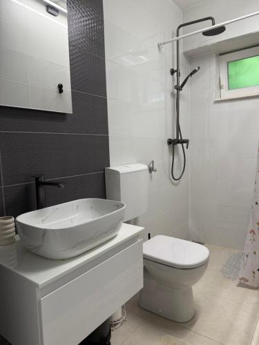 Ένα μπάνιο στο Vacation Apartment Noemi