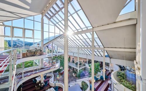 an image of the inside of a building with escalators at Hotel Wutzschleife in Rötz