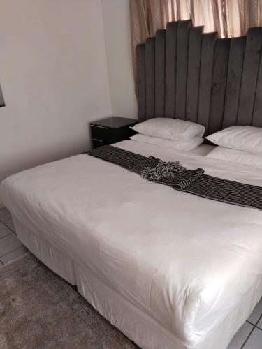 Katil atau katil-katil dalam bilik di Oak Gardens Bed and Breakfast