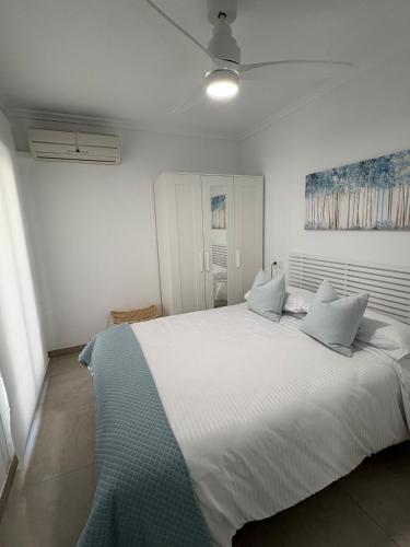 Ένα ή περισσότερα κρεβάτια σε δωμάτιο στο Coco-Cay Beach Bungalow