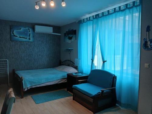 Llit o llits en una habitació de Studio Eva 31