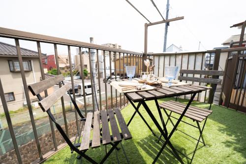 Balkón nebo terasa v ubytování Sakura Railway Inn Odawara