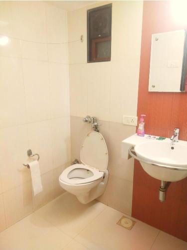 Un baño de Hotel Delight Landmark