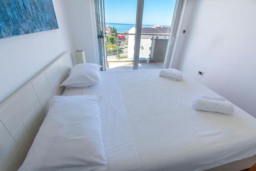 Postel nebo postele na pokoji v ubytování Apartment Belle Vue