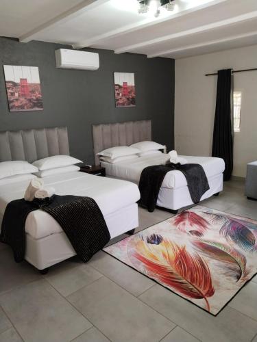 Katil atau katil-katil dalam bilik di Oak Gardens Bed and Breakfast