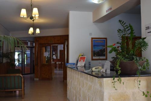 The lobby or reception area at Anna Hotel Apartments
